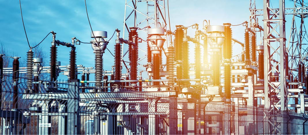 High voltage circuit breaker in a power substation.Electric power transmission lines in the evening. High voltage switchgear and equipment of power plant.Banner.